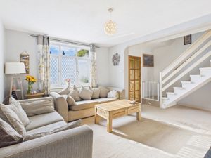 sittng room towards staircase- click for photo gallery